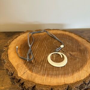 Silver Crescent Pendant Necklace with Gray Suede Cord